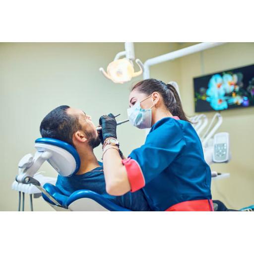 dentist-dental-nurse-using-dental-equipment_397897-548.jpg