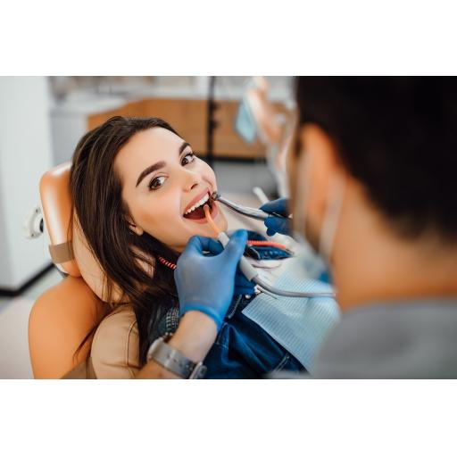 young-female-patient-visiting-dentist-office.jpg